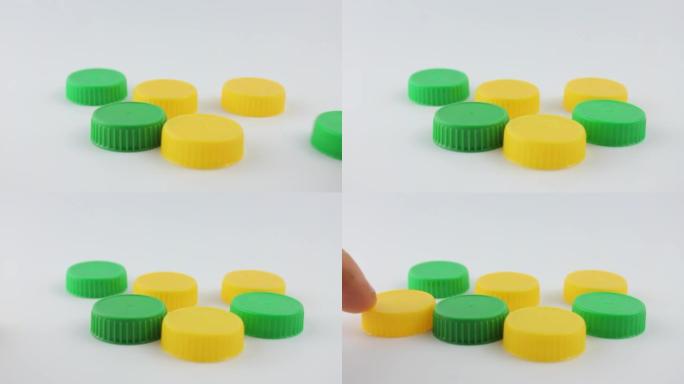 Plastic caps are green and yellow. Plastic caps fr