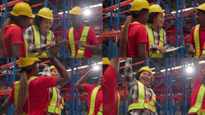 一个快乐的黑人女性工业工人和她的工程团队的特写。一群产业工人携手庆祝重大成功。仓库内