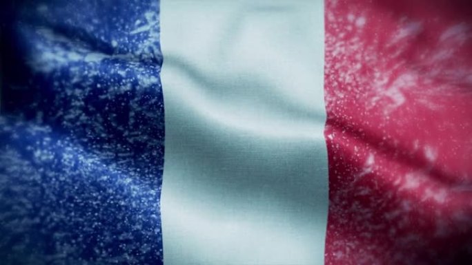4K暴风雪/雪在法国国旗股票视频。冷淡的法国国旗。旋转/旋转的冰晶。雪花掠过法国国旗。