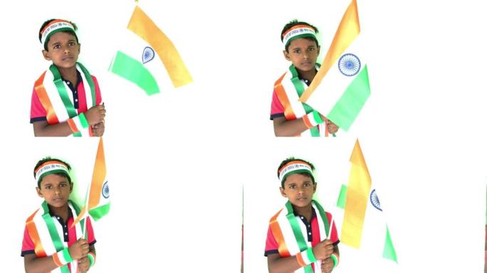 印度男孩在户外举着三色印度国旗，在空中挥舞着国旗。独立日-假日和共和国日