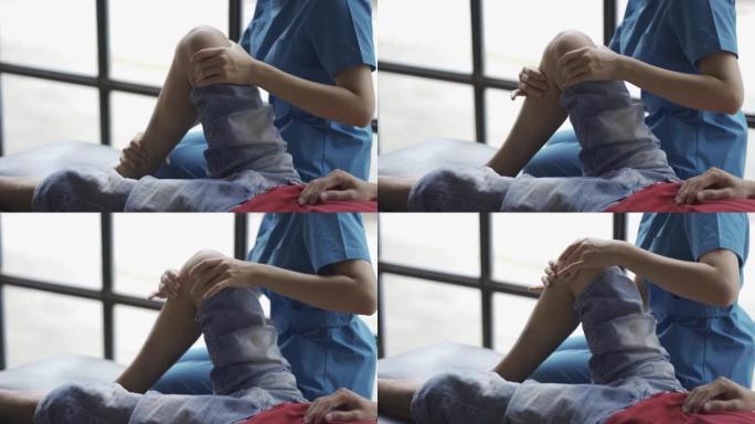 理疗师工作腿部康复运动女护士在床上辅导患者