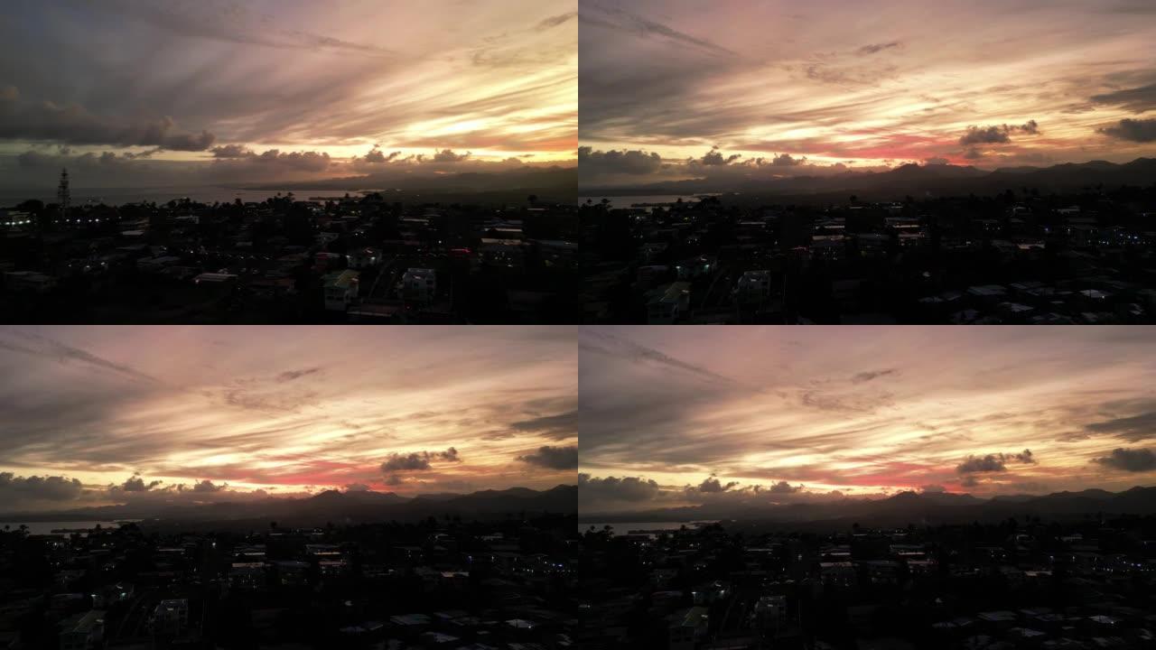 日落时苏瓦的空中无人机镜头。斐济首都。