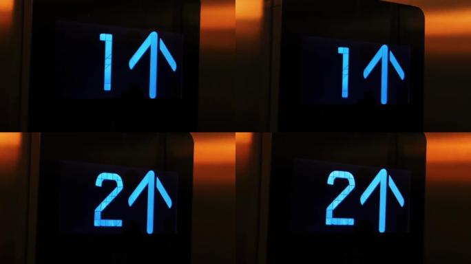 现代电梯屏幕显示箭头从零级别上升到第二，城市生活和技术