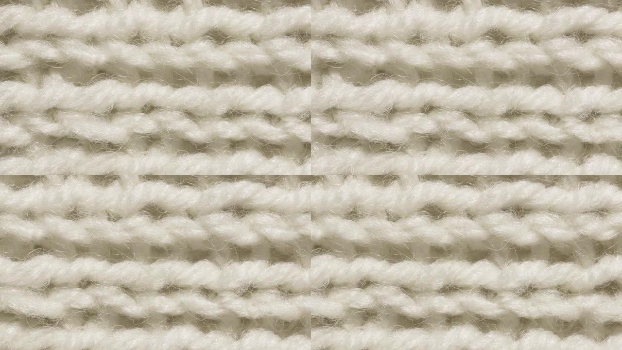 白色羊毛针织纹理无缝环。横向编织钩针详细的行。毛衣纺织背景。宏观特写。