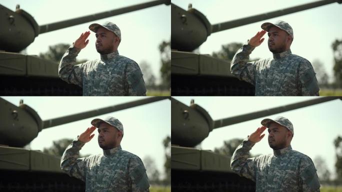身着军装的特种部队士兵在执行外勤任务时，站在对面敬礼。在战争状态下，身着军装的军队守卫者站在主战坦克
