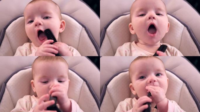 五个月的女婴躺着玩耍，试着把手表表带放进嘴里