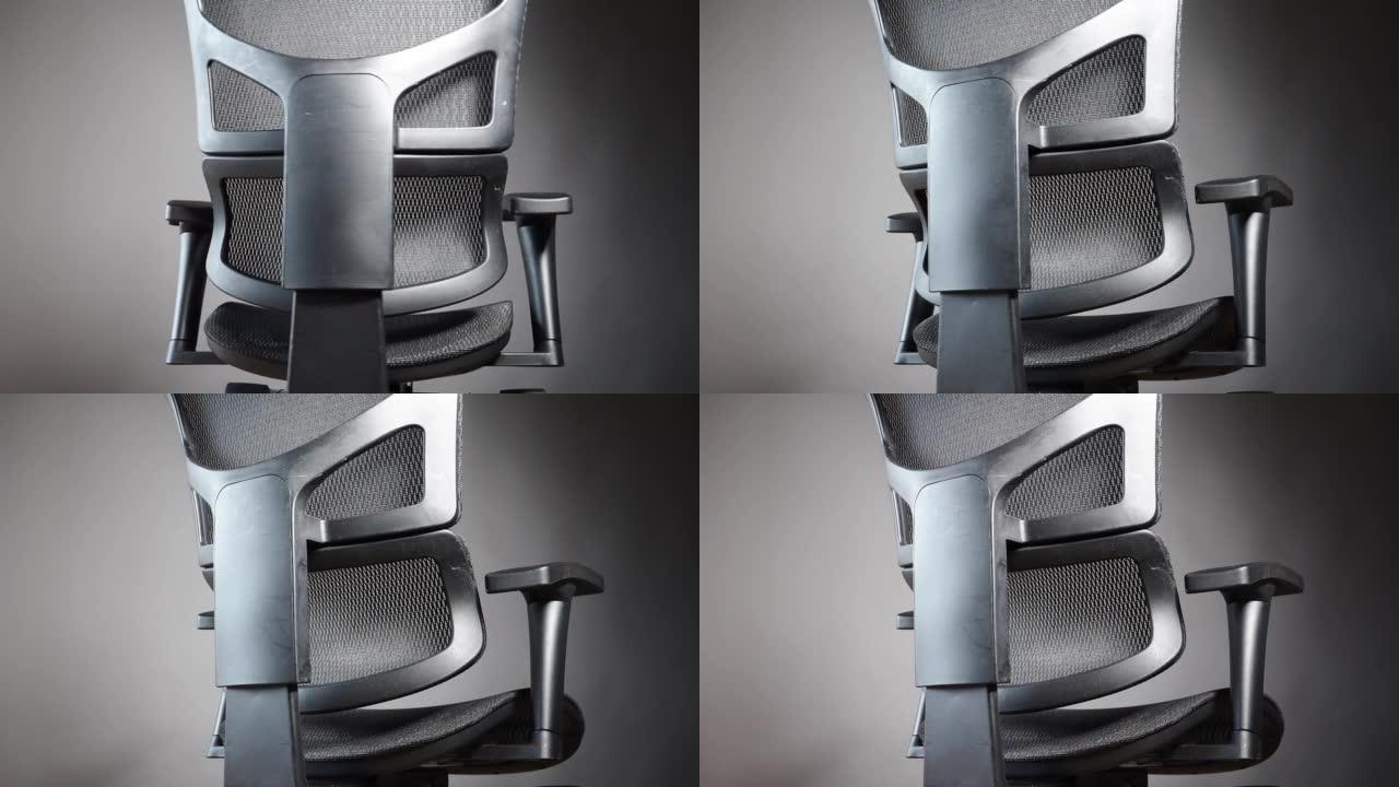 黑色人体工学办公扶手椅设计