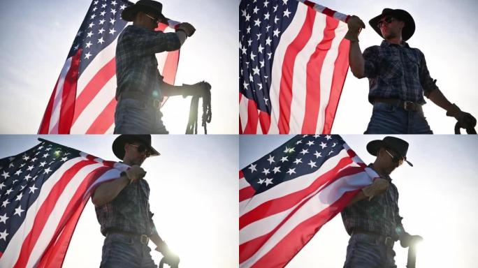 骄傲的白人美国牛仔挥舞美国国旗。