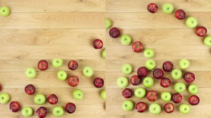 红色美味和奶奶史密斯苹果的停止运动。平坦层。健康食品和多汁水果概念，在桌子上旋转