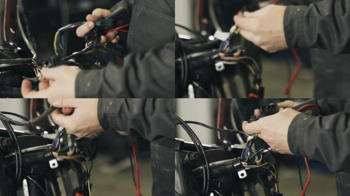 机械师整理出用于连接摩托车电气设备的芯片。