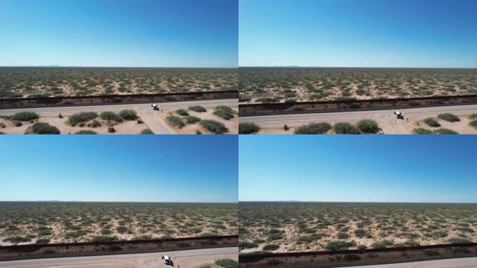 停在墨西哥-美国边境的白色货车 -- 鸟瞰图