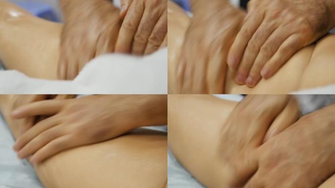 在健康放松按摩的过程中，用按摩师的男性手按摩女性的大腿内侧。