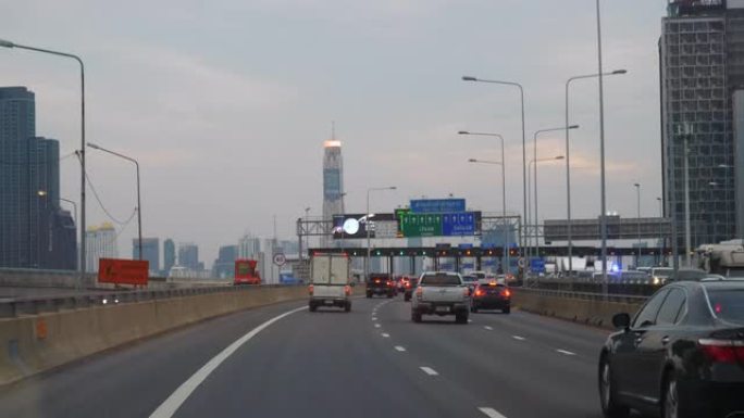 日落时间曼谷城市公路旅行高速公路乘客视点前慢动作全景4k泰国