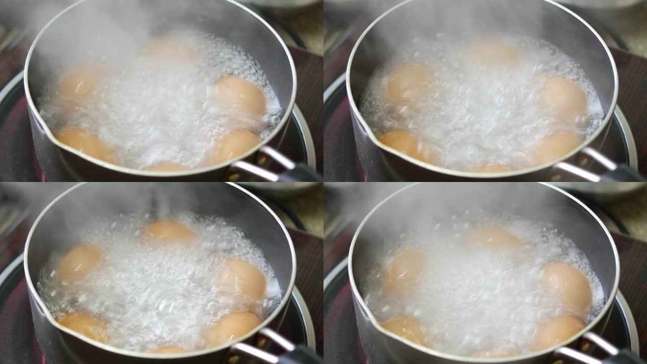 在热水中煮鸡蛋