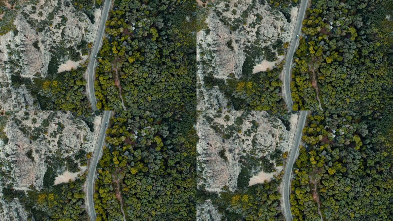 Aerial 4K Footage Top Down of a Car Driving Throug