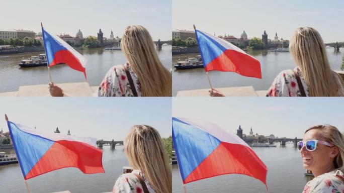 年轻女子热爱这座城市，她举着捷克国旗