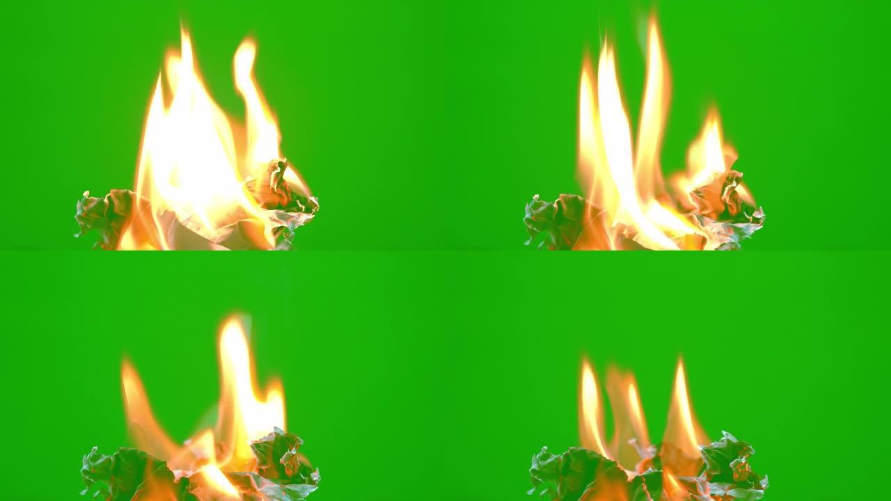 慢火火焰燃烧在绿色屏幕背景上发光