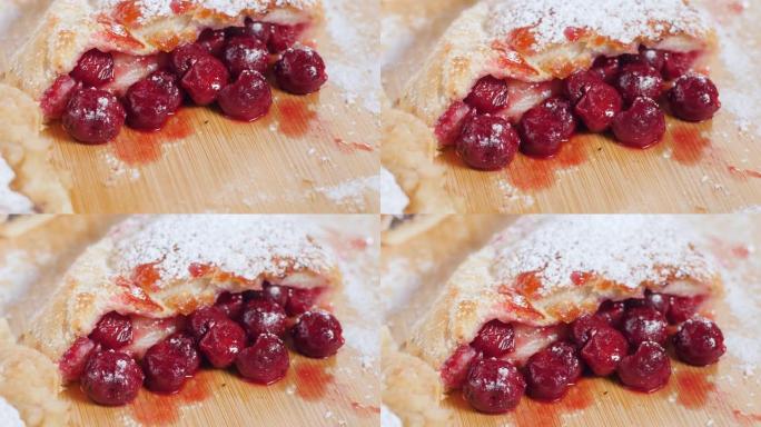 甜面包店的布局，用红樱桃浆果馅料撕碎的新鲜烤面包