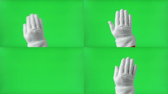 手势包。圣诞老人手触摸，点击，点击，在Chromakey绿色屏幕上滑动。放大，缩小。特写。4k镜头。