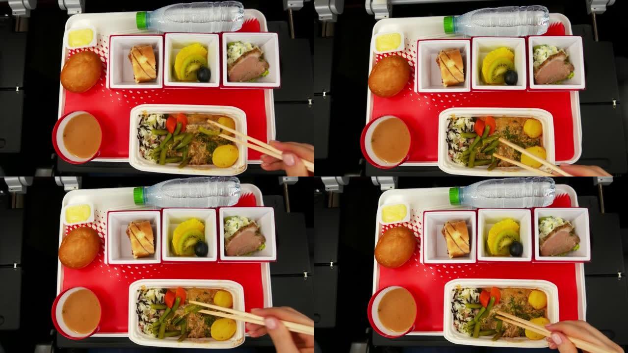 为飞往日本的经济舱乘客提供美味的午餐或晚餐