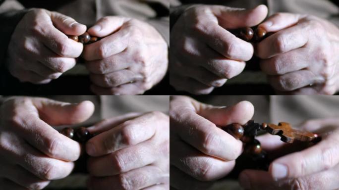 一个老和尚的手的特写视频正在指着念珠。