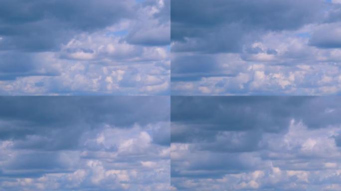 在蓝天上飞舞移动的白云。蓝天背景，有多层微小的卷云。时间流逝。
