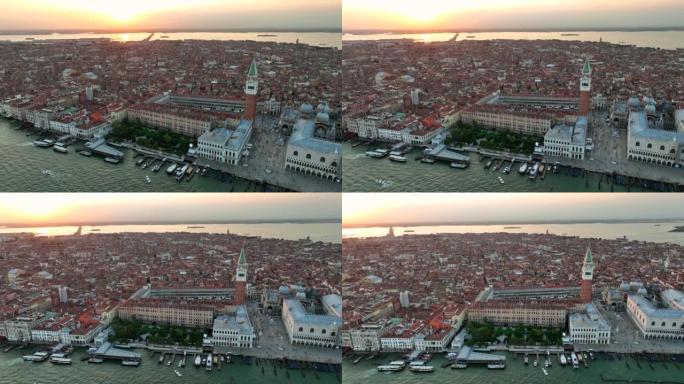 空中无人机日落场景圣玛丽亚德拉致敬罗马天主教堂和小教堂，大运河和卡运河之间的交通船