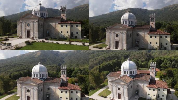 在意大利白云岩山脉的一座教堂上平移时飞过