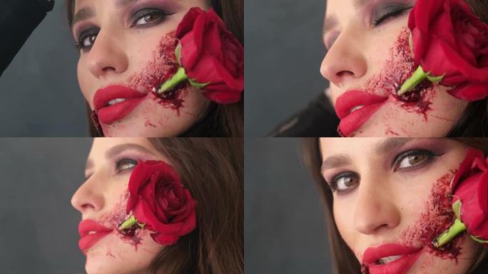迷人的黑发女人，万圣节化妆，嘴里有玫瑰花。高质量4k视频