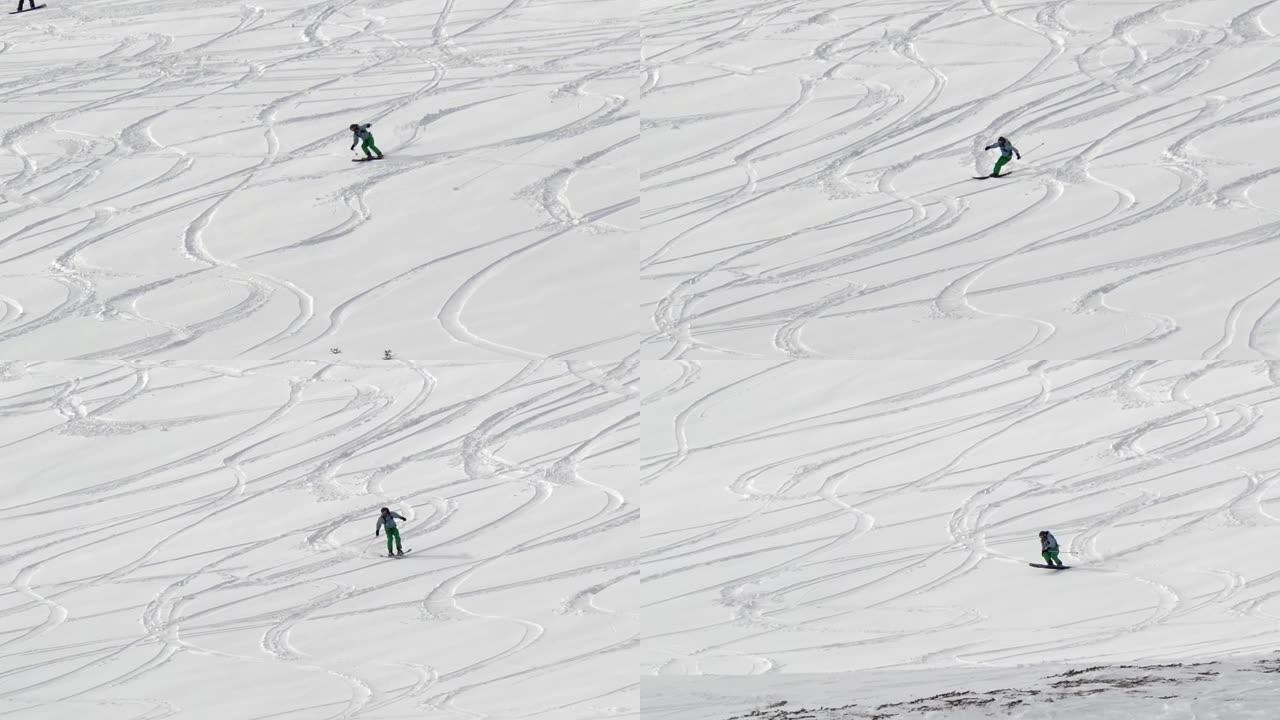滑雪者回到乡村，在深深的雪中自由滑雪