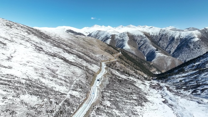 西藏昌都大气雪山公路航拍