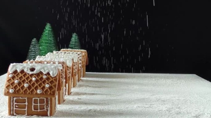 雪对自制姜饼屋圣诞装饰的影响。