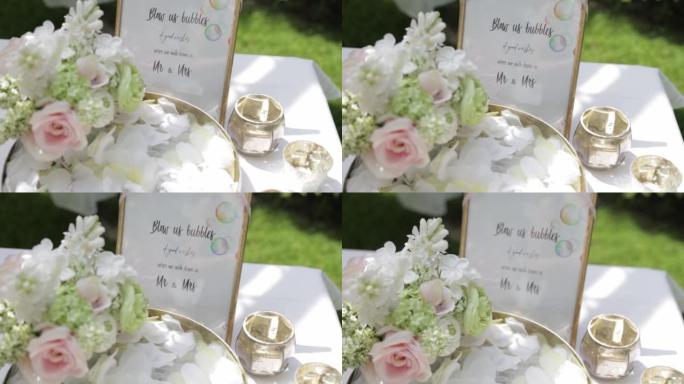 桌子上有名字标志的婚礼装饰品的特写
