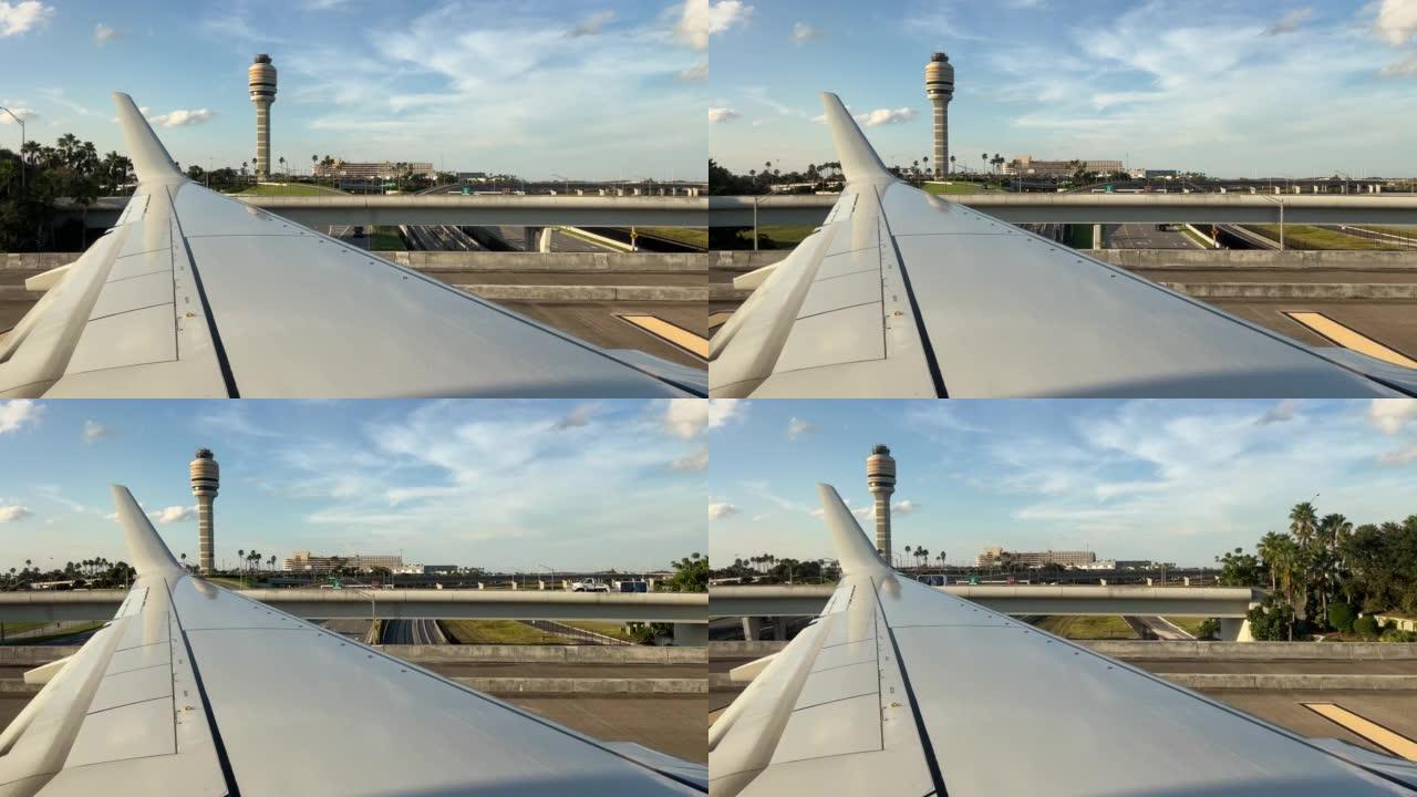 飞机在奥兰多国际机场起飞的途中在桥上滑行
