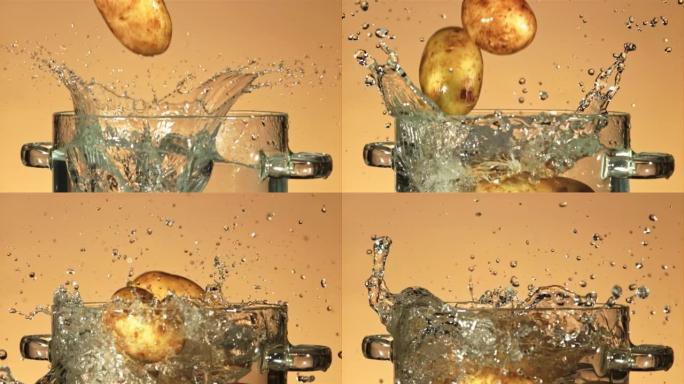 新鲜的土豆溅入一锅水中。以1000 fps的高速相机拍摄。