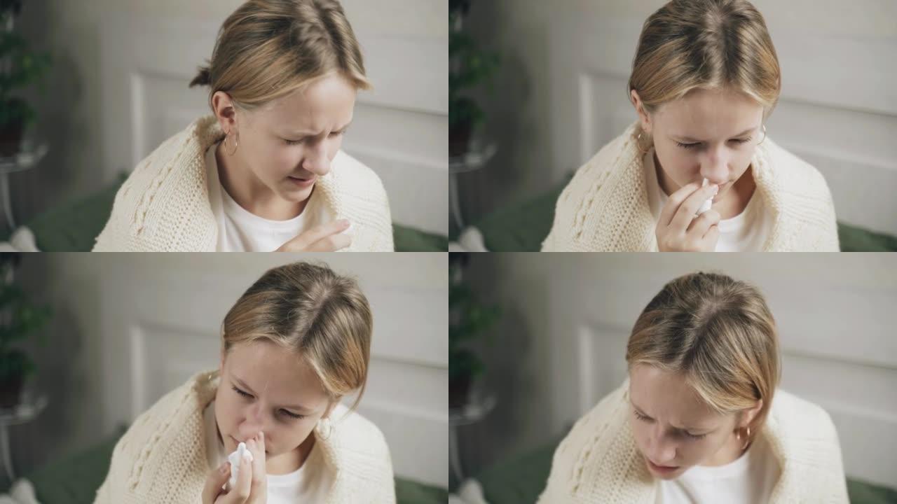 鼻塞的不健康女孩使用鼻喷剂治疗感冒。