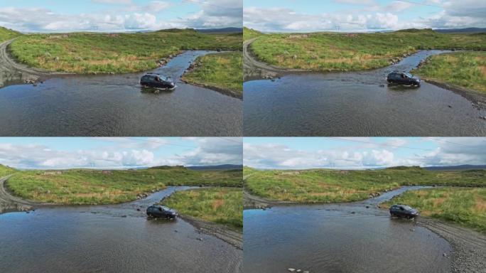 冰岛一辆4x4汽车穿越冰川河的鸟瞰图