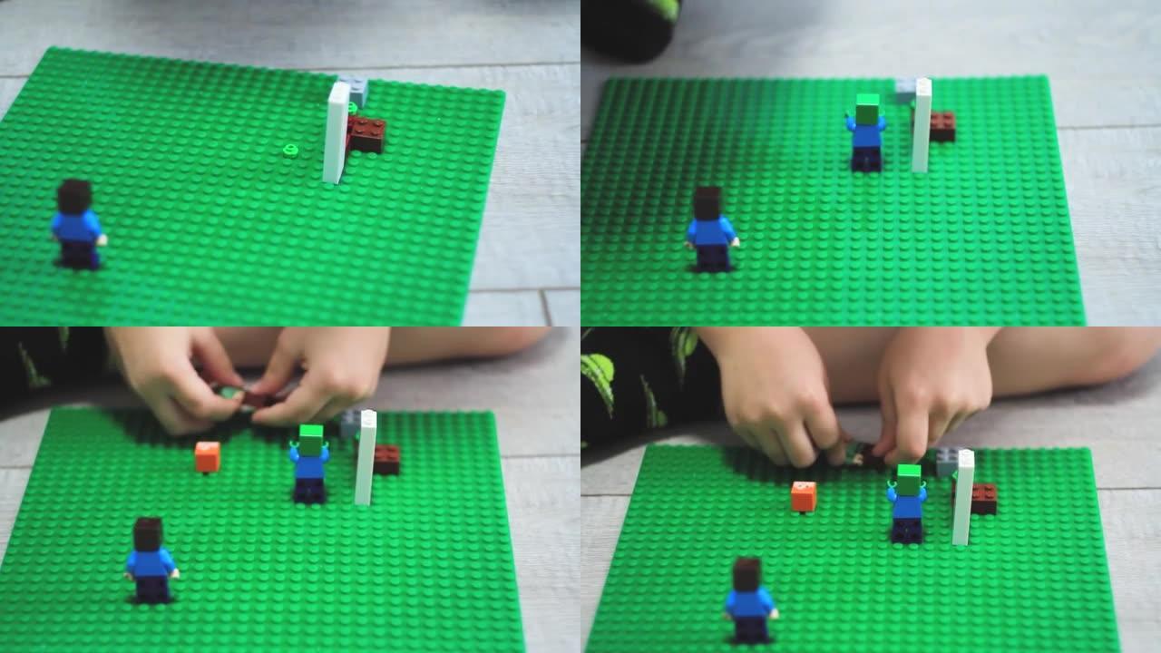 玩建筑套装的小男孩。由立方体制成的迷你图。立方体的构造。