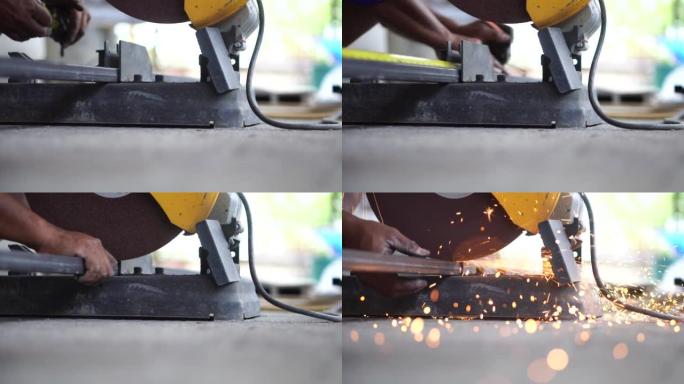 专业工人用钢刀切割钢材，火花，慢动作
