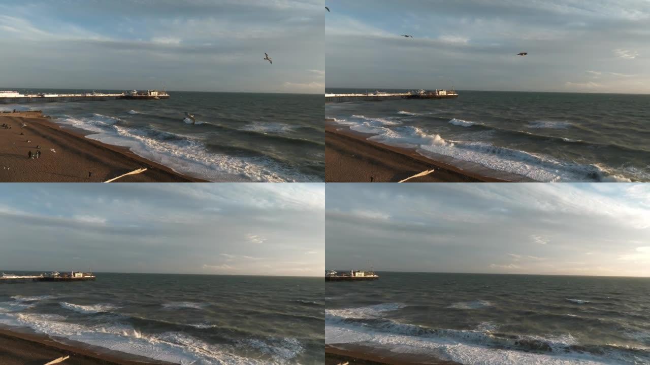 美丽的布莱顿海滩4k视频。英国布莱顿的神奇日落和暴风雨天气。