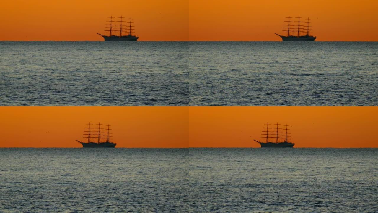 海景-海中高大的船-日落时的轮廓