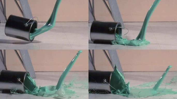 浅绿色的油漆从罐中倒出。掉漆可以库存视频。