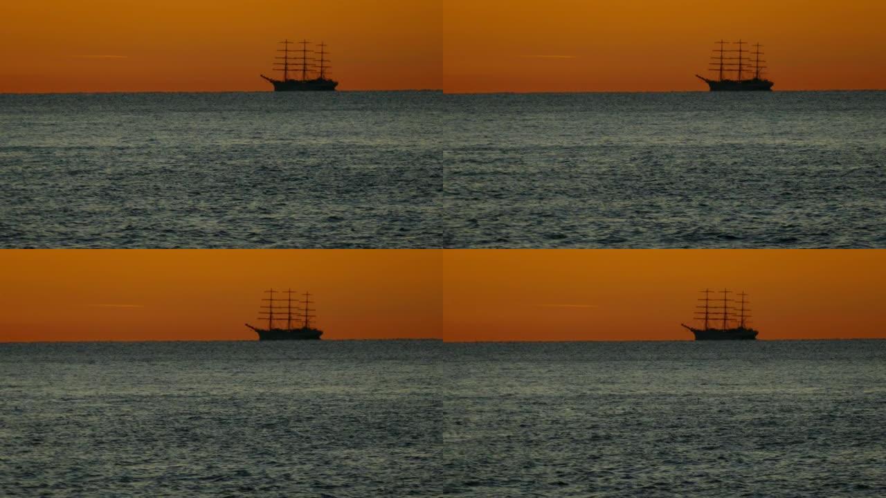 日落海景-海中高大的船