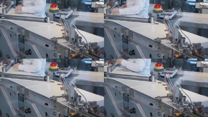 工业工厂的巧克力生产自动化机器人生产线，慢动作