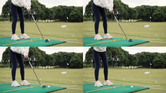 女性初学者练习高尔夫，但未能击球，4k慢动作镜头。