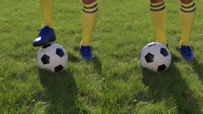 足球运动员用脚踢球，近景，慢动作。足球世界杯。