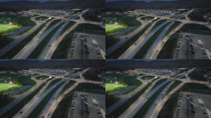 位于纽约州伍德伯里的空中，无人机，晚间视频，以正常速度拍摄的diamond interchange 