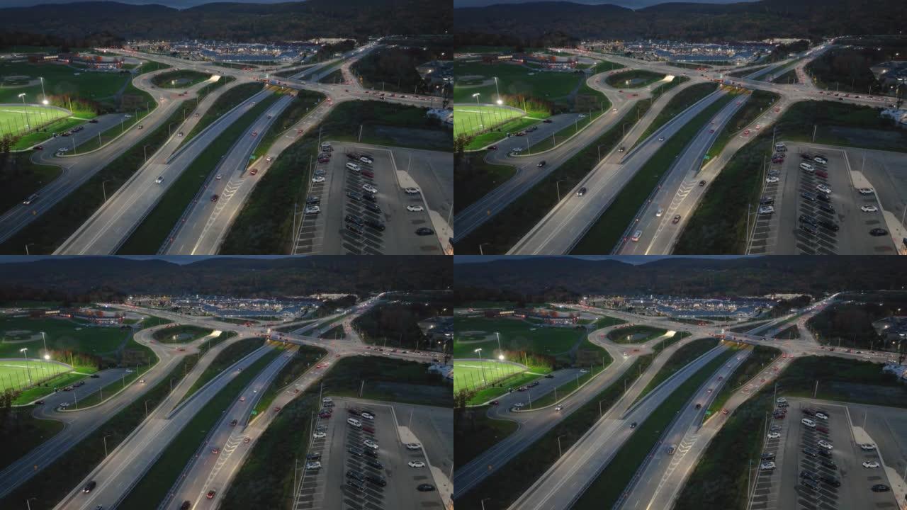 位于纽约州伍德伯里的空中，无人机，晚间视频，以正常速度拍摄的diamond interchange 