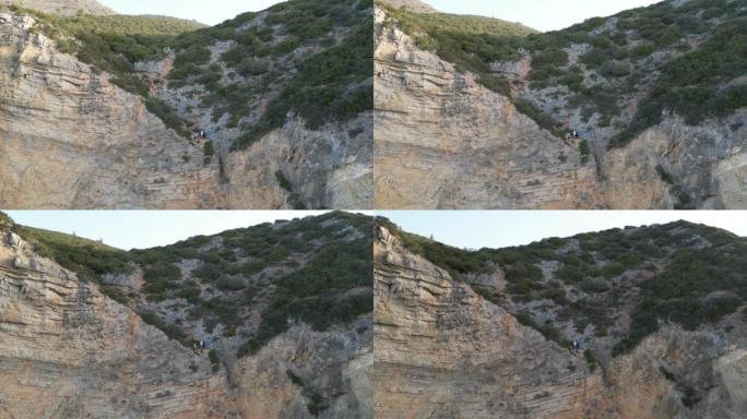 葡萄牙塞辛布拉悬崖边悬挂的人们的风景照片