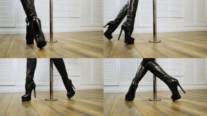 高塔附近舞者腿的特写。脚在黑色高跟靴，在舞蹈动作中移动